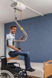 Deckenlifter mit Deckenmotor , Handi-Move Hebebügel®